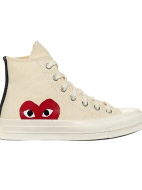COMME des GARCONS PLAY
Converse Emblem Canvas Off
White Sneakers
